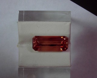photo number one of Sunstone 6.54 Ct 16.7x7.1 Emerald Cut Orange item 646